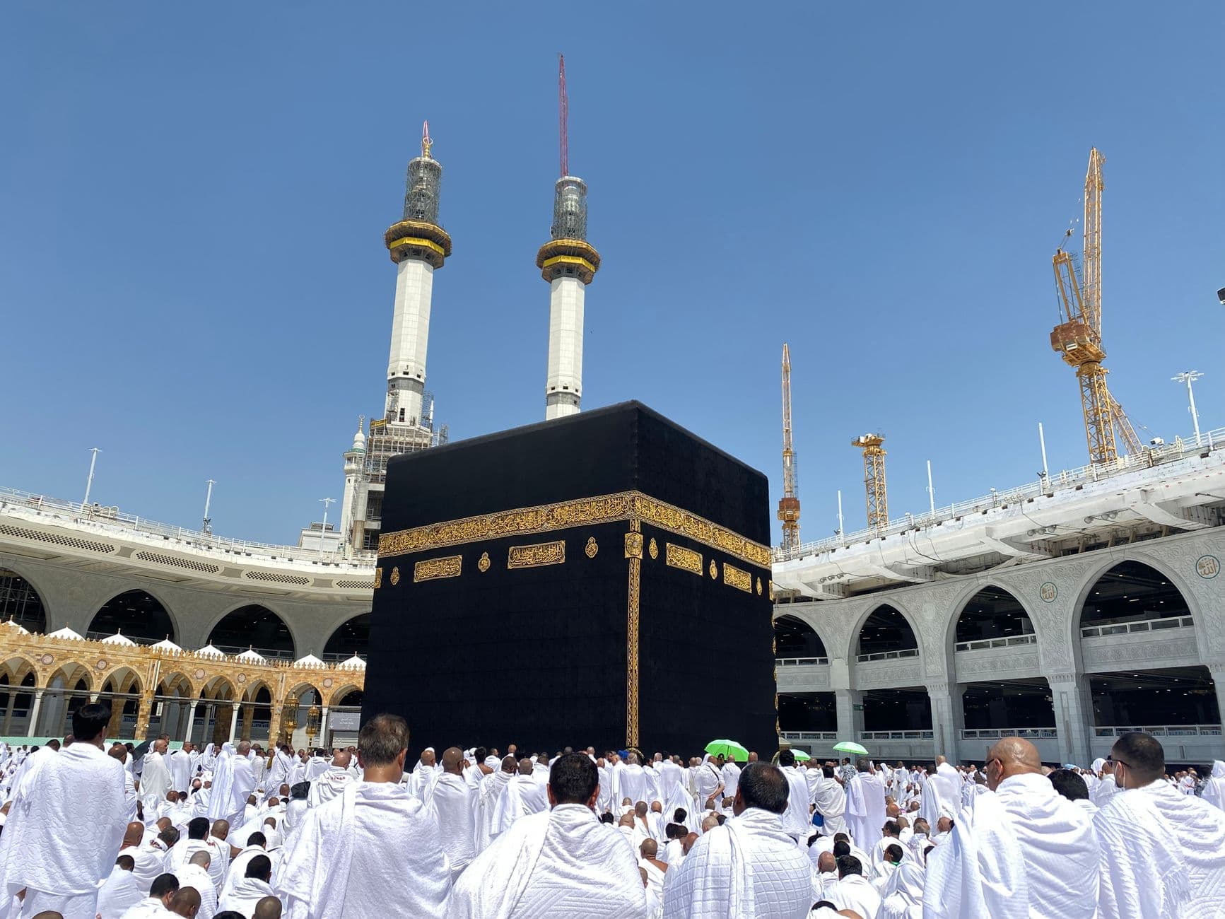 Pilgrims in ihram at the Kaaba, Masjid al-Haram, Makkah